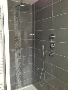 Bathroom refurbishment included new rain shower and shower hand wand