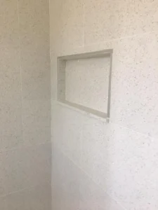 Recessed shower feature